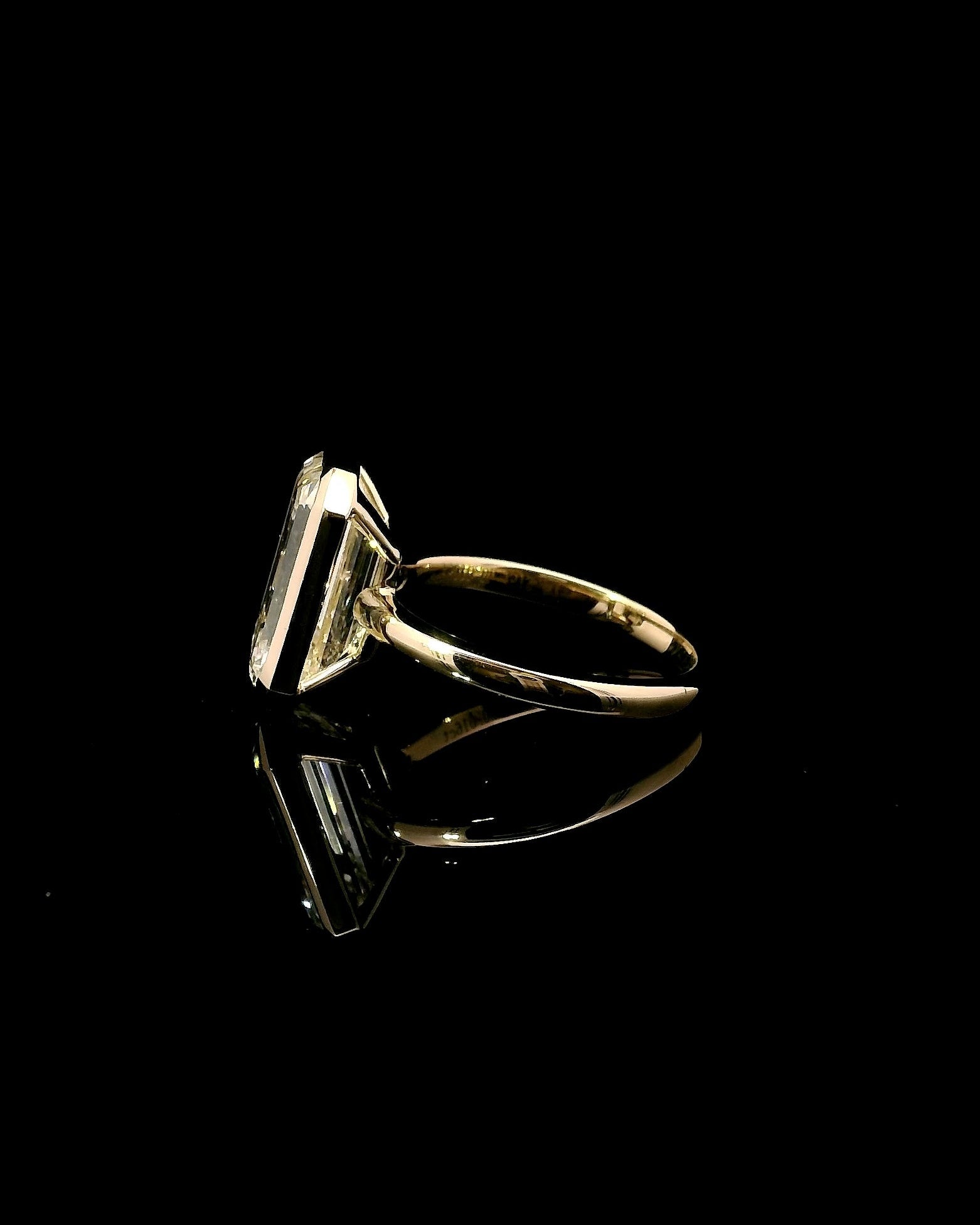 4.21 Emerald Bezel Solitaire